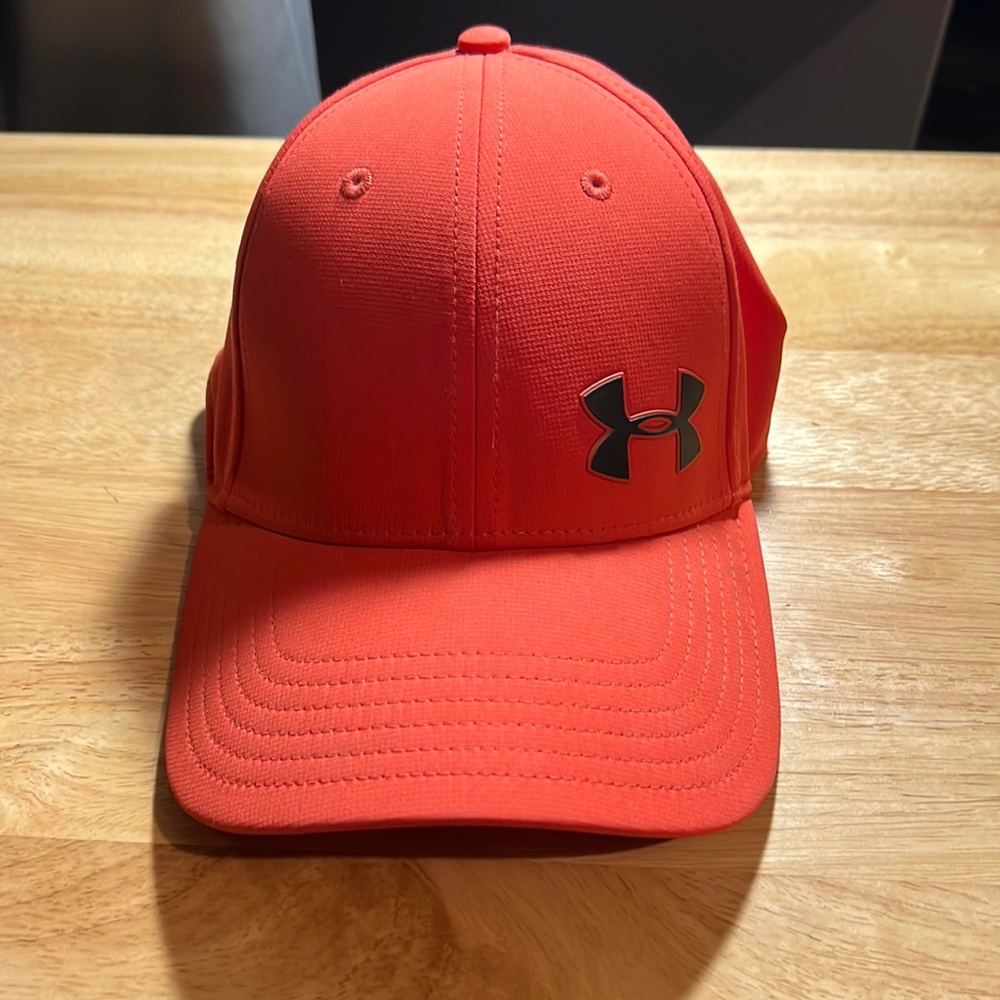 Light red Under Armor hat good condition, worn once.
